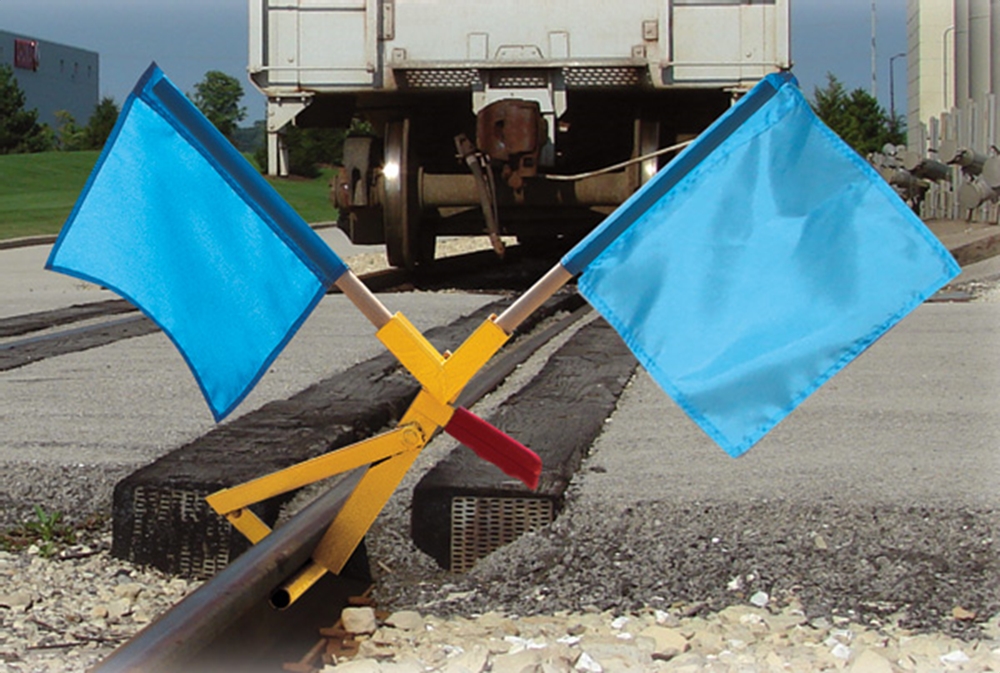 Clamp-on Twin Nylon Flag Holder

Steel holder, clamps to rail head. 
Twin sockets accept 7⁄8" dia. flag holder. 
Weight 7.5 lbs.